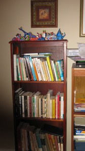 My Oaxacan Critters atop more books